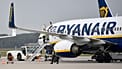 FILE. A Ryanair plane parks at the airport in Weeze, Germany, Sept. 2018