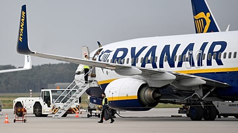 FILE. A Ryanair plane parks at the airport in Weeze, Germany, Sept. 2018