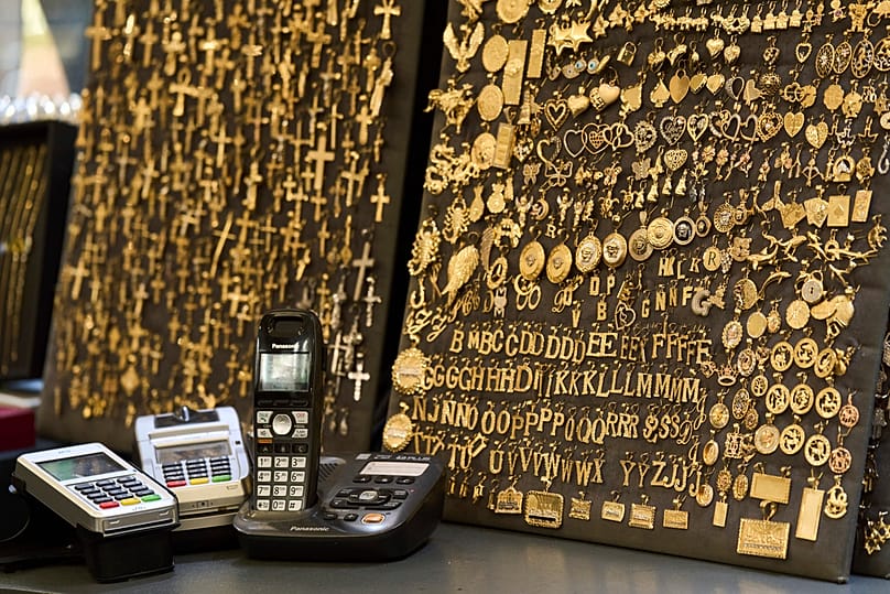 FILE - Gold jewelry are displayed for sale at V&P Jewelry in the St. Vincent Jewelry Center in the Jewelry District of Los Angeles in Los Angeles, Wednesday, April 30, 2025.