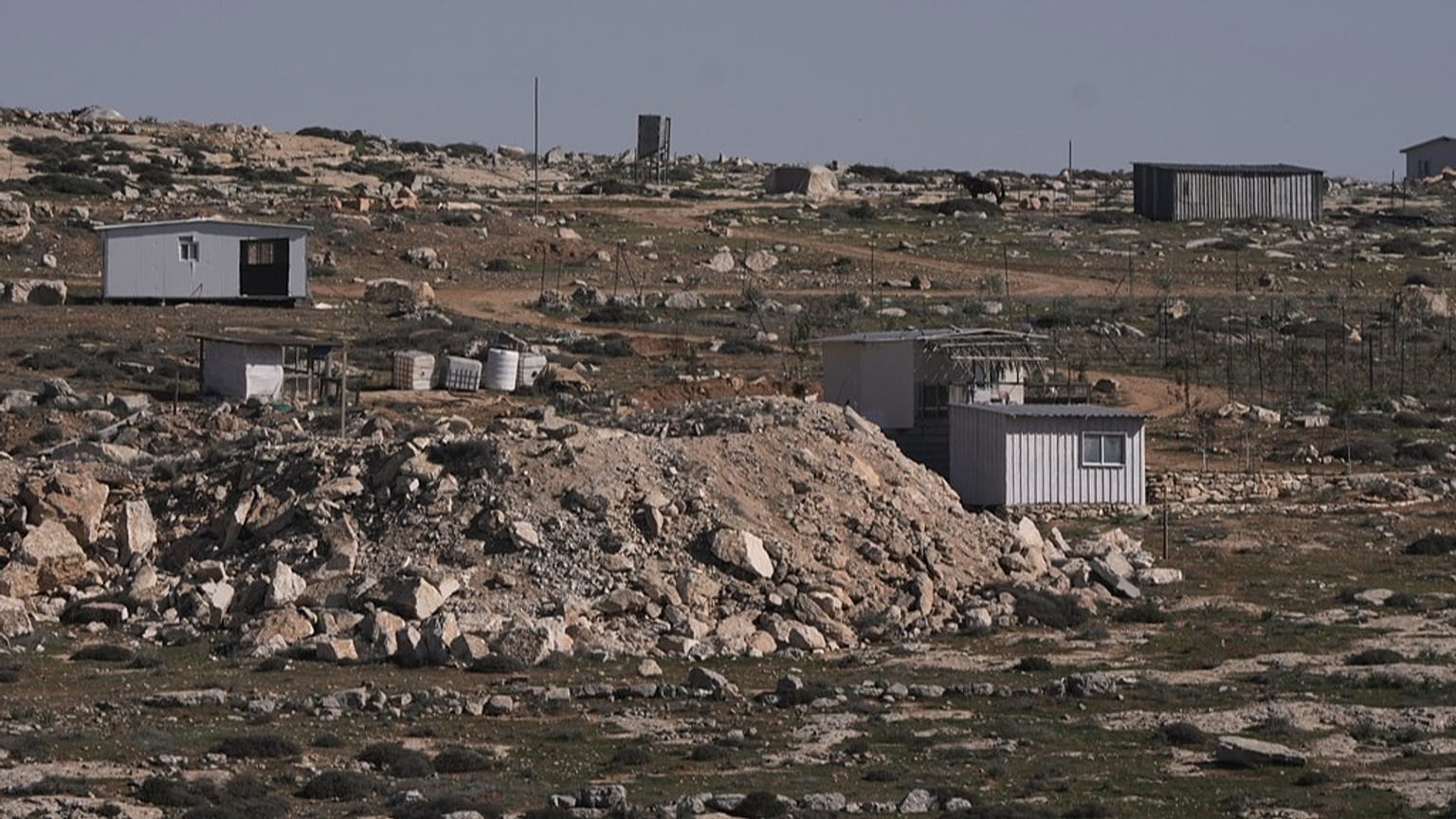 An Israeli settlers outpost is seen on area next to the town of As Samu', near the West Bank city of Hebron, Tuesday, Dec. 23, 2025.