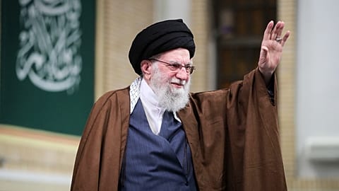 FILE: Iran's Ayatollah Ali Khamenei waves in his meeting with a group of students in Tehran, 3 November 2025