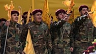 FILE: Hezbollah fighters shout slogans during the funeral procession of Hezbollah's chief of staff, Haytham Tabtabai, in the southern suburb of Beirut, 24 November 2025