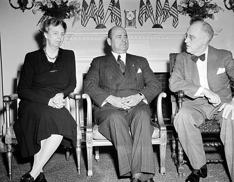 FILE - President Isaías Medina Angarita shares a laugh with President Franklin D. Roosevelt and first lady Eleanor Roosevelt, 20 Jan, 1944, during a visit to Washington.