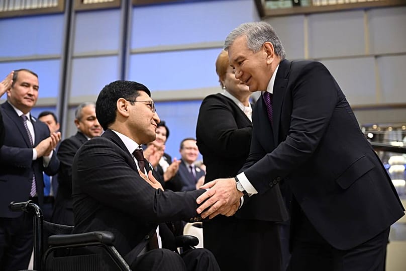 President Shavkat Mirziyoyev meets participants after his annual address to Parliament