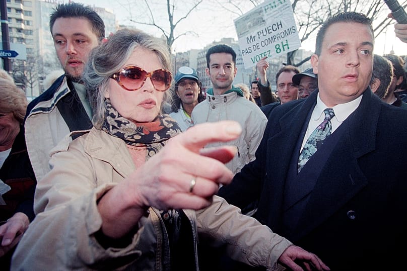 Former French movie star and animals rights activist Brigitte Bardot gestures during a demonstration to protest the duration of the transport of animals for butchery,