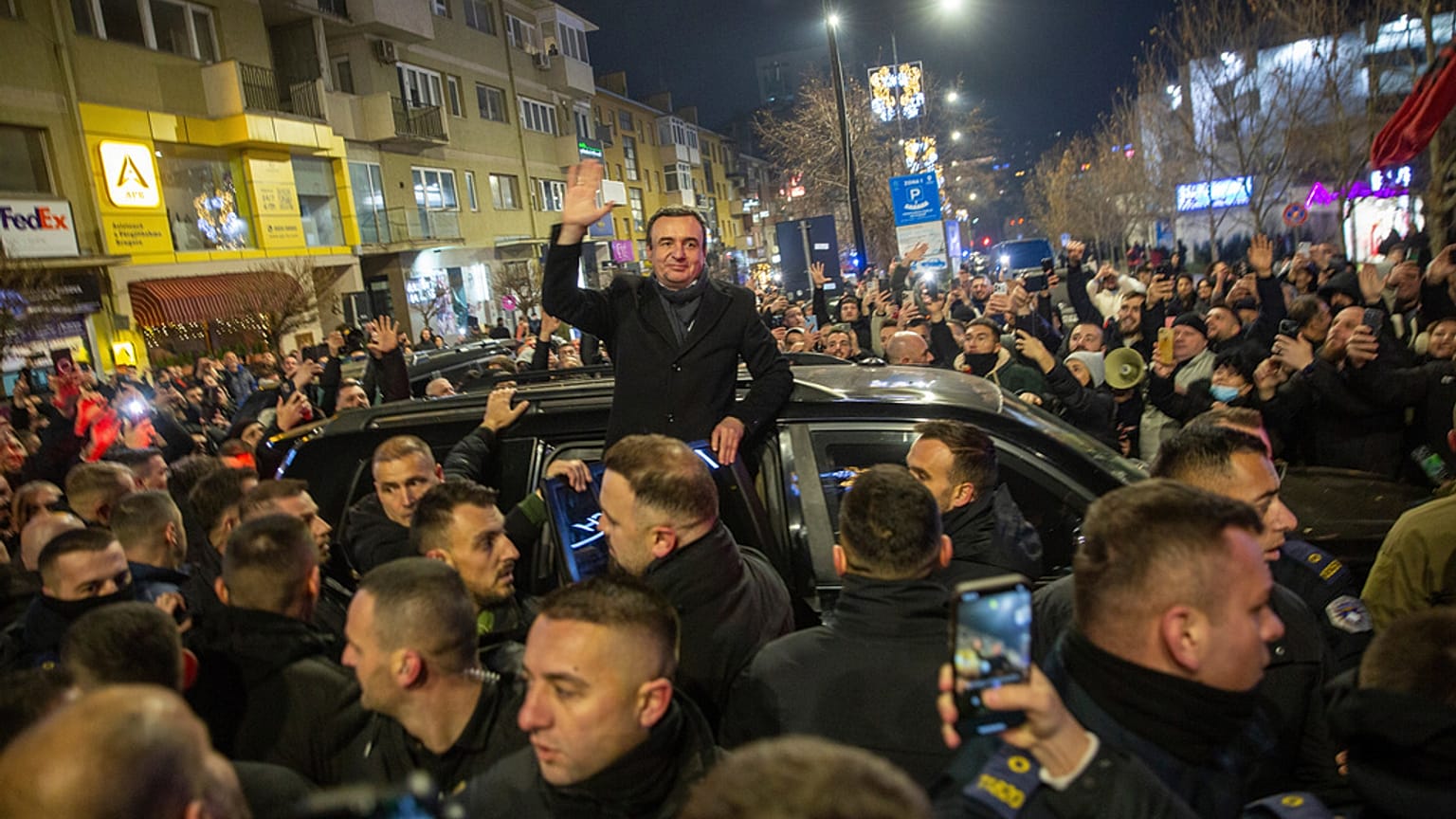 Kosovo's PM and leader of LVV political party Albin Kurti greets his supporters in Pristina, 28 December 2025