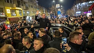 Kosovo's PM and leader of LVV political party Albin Kurti greets his supporters in Pristina, 28 December 2025