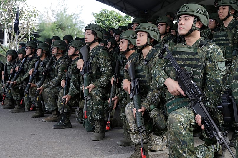 Taiwan reservists pose during a reserve military training in Ilan County, 2 December, 2025