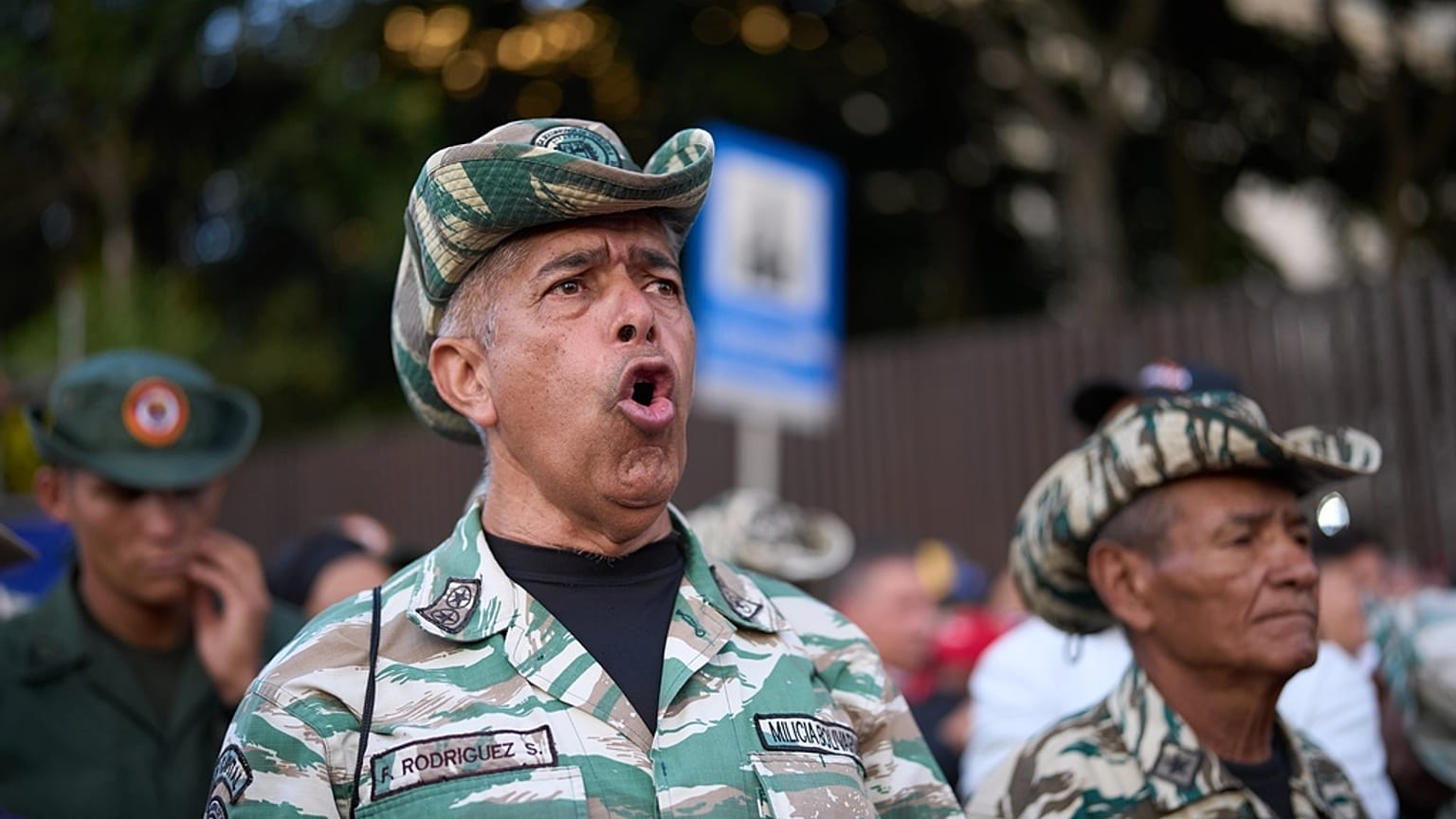 FILE: Bolivarian Militia members attend a government rally in Caracas, 15 December 2025