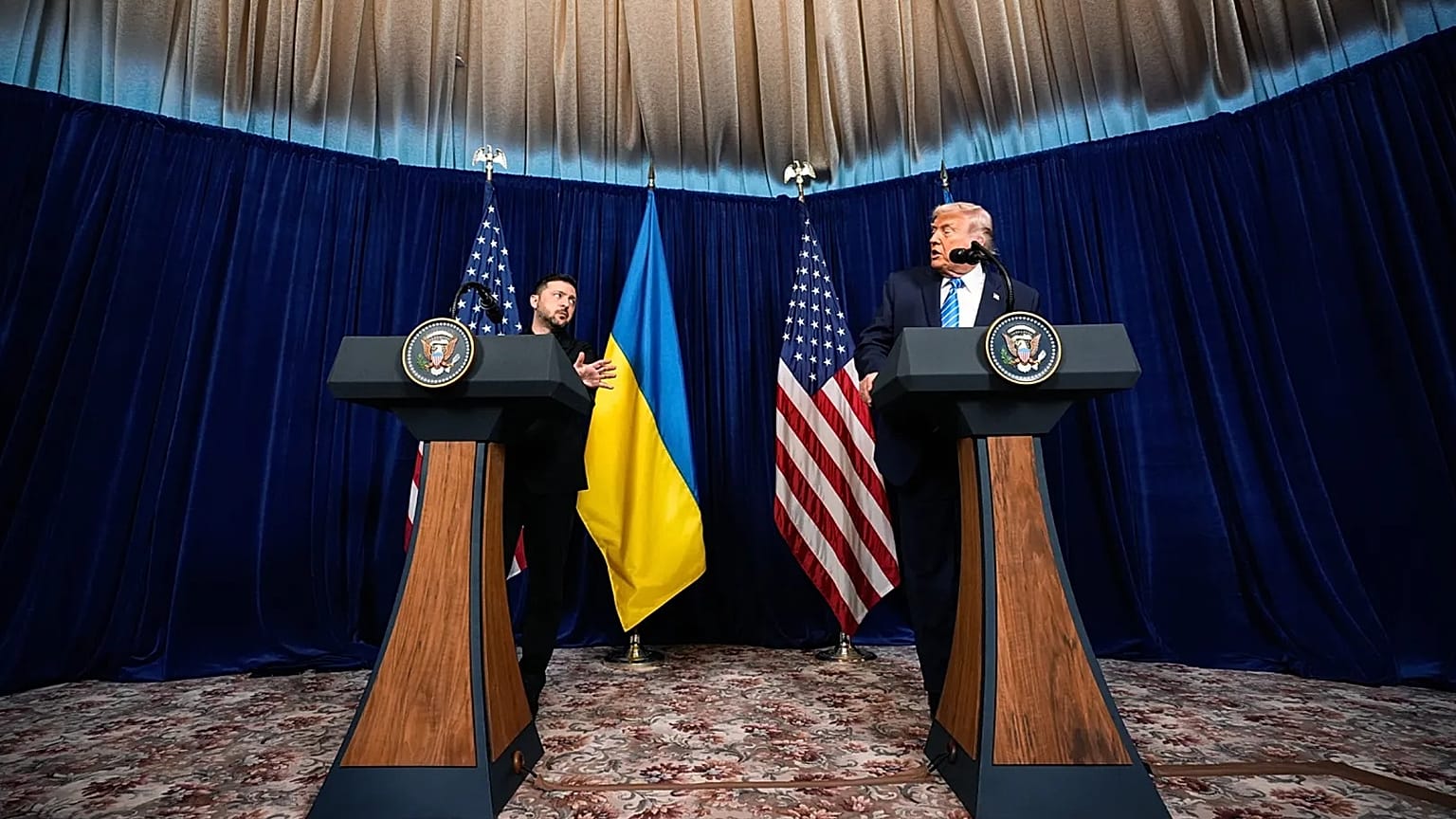 Donald Trump and Ukraine's President Volodymyr Zelenskyy speak at a joint news conference following a meeting at Trump's Mar-a-Lago club, Sunday, Dec. 28, 2025, in Palm Beach,