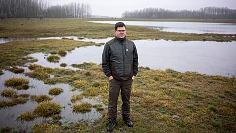 Oszkár Nagyapáti, farmer and member of the volunteer water guardians group, stands by an artificial lake in Kiskunmajsa, Hungary, 29 July 2025. 