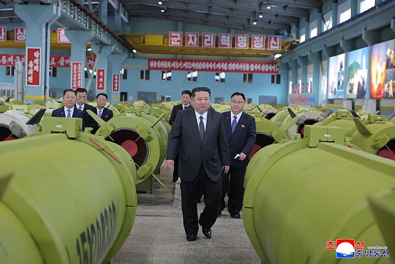 Kim Jong-un inspects missile and shell production at a factory in an undisclosed location in North Korea, 26 December, 2025 