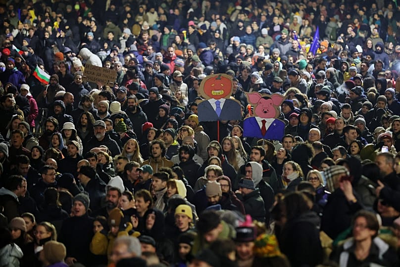 Caricatures of ruling leaders seen on posters as tens of thousands of people filled the streets of the capital and other major cities in Bulgaria, 18/12/25