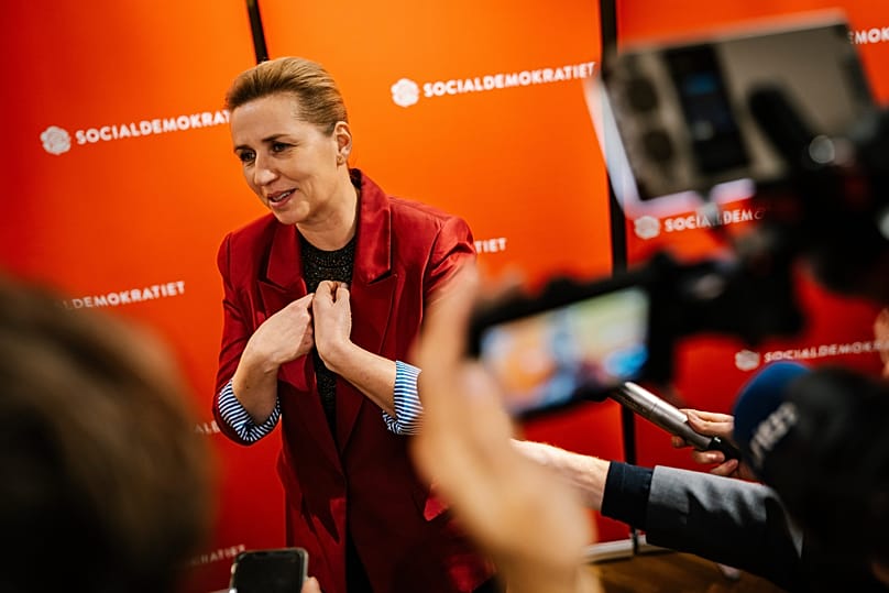 Danish Prime Minister Mette Frederiksen holds a doorstep after her speech during the Social Democrats' election party at the Workers' Museum in Copenhagen Tuesday, Nov. 18