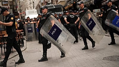 ARCHIVE: Police officers take precautions for protests against LeMan magazine, which published a cartoon allegedly depicting the Prophet Muhammad, in Istanbul. Tuesday 1 July 2025