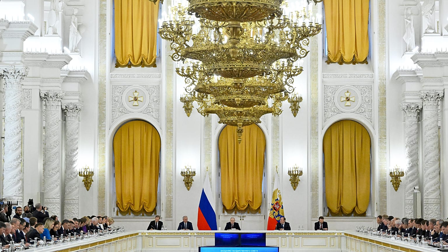 Russian President Vladimir Putin, center, chairs a meeting of the State Council on training professionals for Russian economy at the St. George's Hall of the Grand Kremlin Pal