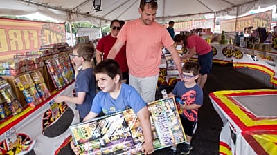 Fireworks tent in the parking lot of Cave Spring Corners shopping center, US
