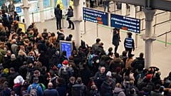 Travellers queue for Eurostar services at St Pancras International station in London, 30 December 2025