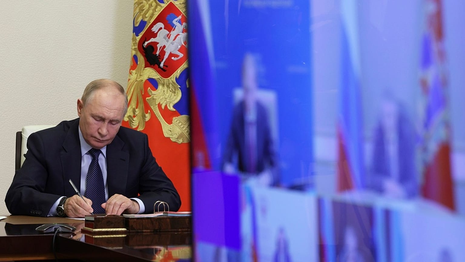 FILE: Russian President Vladimir Putin holds a meeting about the situation in border areas of Belgorod, Kursk and Bryansk regions of Russia, 22 August 2024