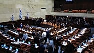 FILE: Israeli lawmakers are gathered for a vote in the Knesset, Israel's parliament, Jerusalem, June 14, 2023