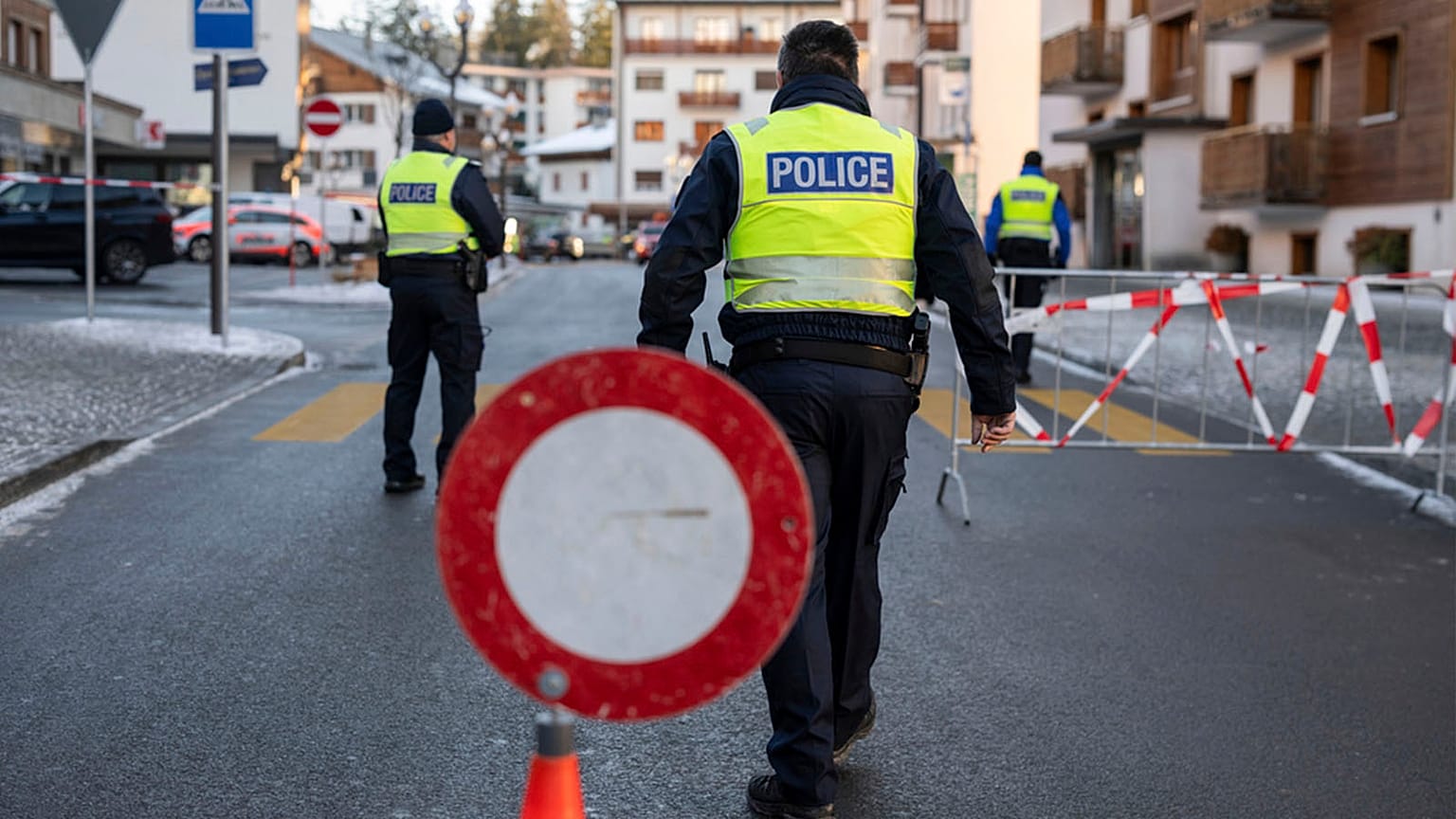 Police officers inspect the area where a fire broke out at the bar and lounge during New Year’s celebration, in Crans-Montana, Swiss Alps, 1 January 2026