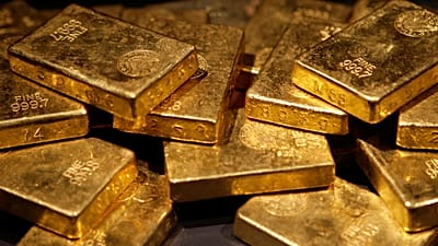 سبائك ذهبية معروضة في معرض "الذهب" بالمتحف الأمريكي للتاريخ الطبيعي في نيويورك. (صورة من وكالة أسوشيتد برس/سيث وينيغ، أرشيفية)