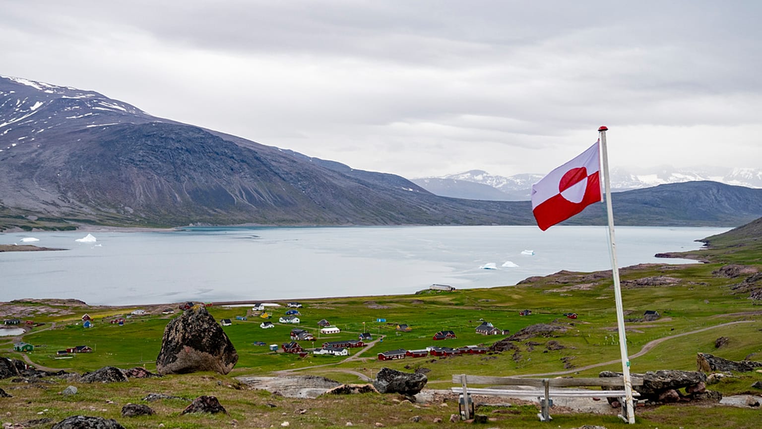 FILE: A view of a Greenland flag in the village of Igaliku in Greenland, 4 July 2025