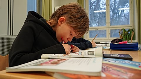 Ten-year-old fourth grade student Ilo Lindgren works during a media literacy class at Tapanila Primary School in Tapanila, Finland.