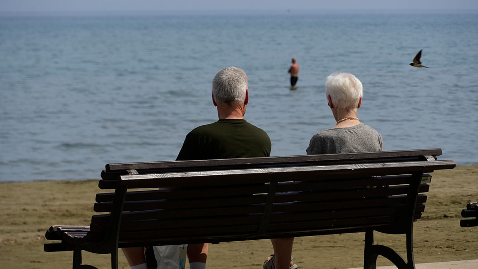 A couple of tourists enjoy the sun and the sea in southern Cyprus. 