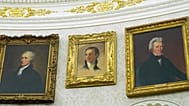 A portrait of President James Monroe, centre, hangs between paintings of Alexander Hamilton and Andrew Jackson at the White House.