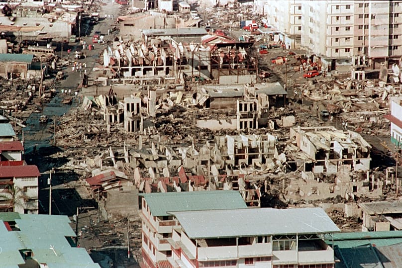 This aerial view of Panama City, made Sunday Dec. 25, 1989 shows of the destruction resulting from the american invasion of Panama. (AP Photo/Michael Strovato)