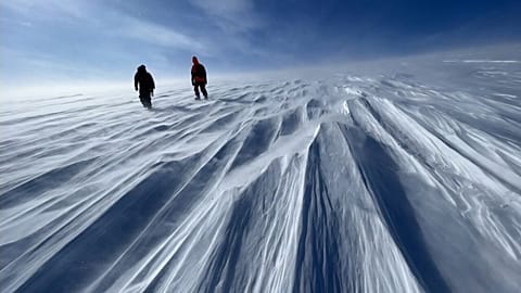 GreenDrill team members at Prudhoe Dome, a key ice cap part of the Greenland Ice Sheet. 