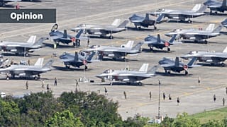 US F-35 fighter jets are parked on the tarmac as military personnel walk among the aircraft at José Aponte de la Torre Airport in Ceiba, Puerto Rico, 3 January 2026