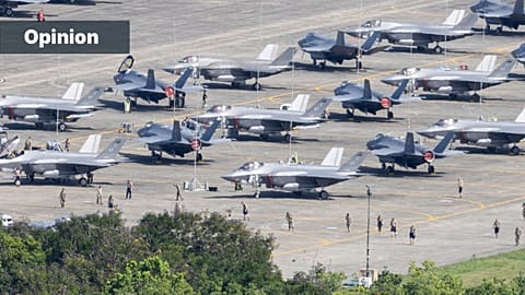 US F-35 fighter jets are parked on the tarmac as military personnel walk among the aircraft at José Aponte de la Torre Airport in Ceiba, Puerto Rico, 3 January 2026
