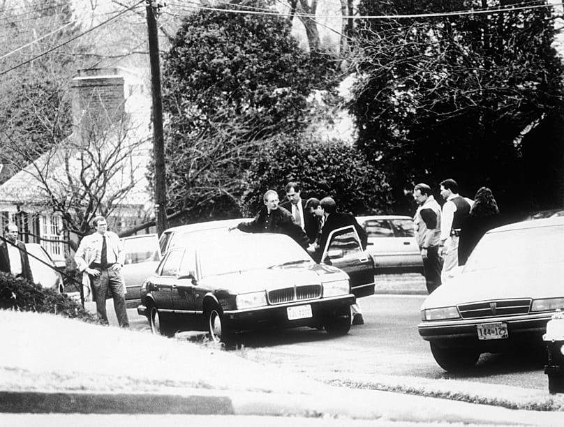 In this handout photo from the FBI agents arrest CIA officer Aldrich Ames in Arlington, 21 February, 1994