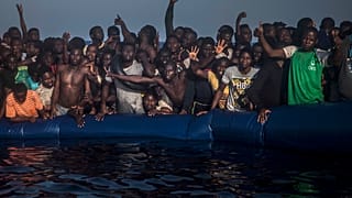 Boat carrying dozens of migrants bound for Spain returns to Gambia after taking on water