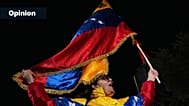 FILE: A demonstrator waves a Venezuelan flag at a protest against US strikes on Venezuela, outside the US embassy in Nicosia, 5 January 2025