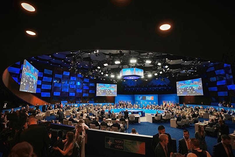 FILE - Delegates attend a plenary session at the NATO summit in The Hague, Netherlands, 25 June 2025.