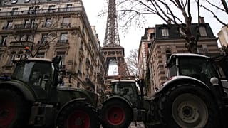 Tractors line up near the Eiffel Tower as farmers protest the EU's intention to move forward with the Mercosur deal with South American nations, in Paris, 8 January 2026