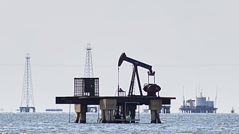 An oil pump jack stands unused in Cabimas, 7 January 2026