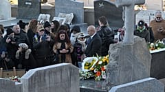 People queue to pay their respects on actor Brigitte Bardot's tomb