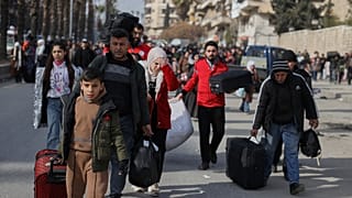 Tens of thousands flee Aleppo as clashes intensify and evacuation orders expand