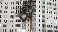 A residential building is seen damaged after a Russian strike in Kyiv, 9 January 2026