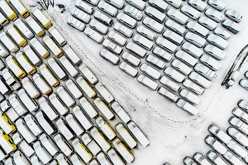 Vehicles covered in snow are parked in Dowlais, 9 January, 2026