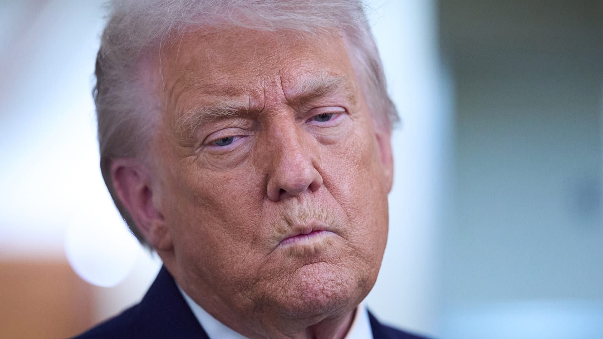 President Donald Trump speaks to journalists aboard Air Force One after leaving the World Economic Forum in Davos en route to Washington, Thursday, January 22, 2026. Copyright 2026 The Associated Press. All rights reserved