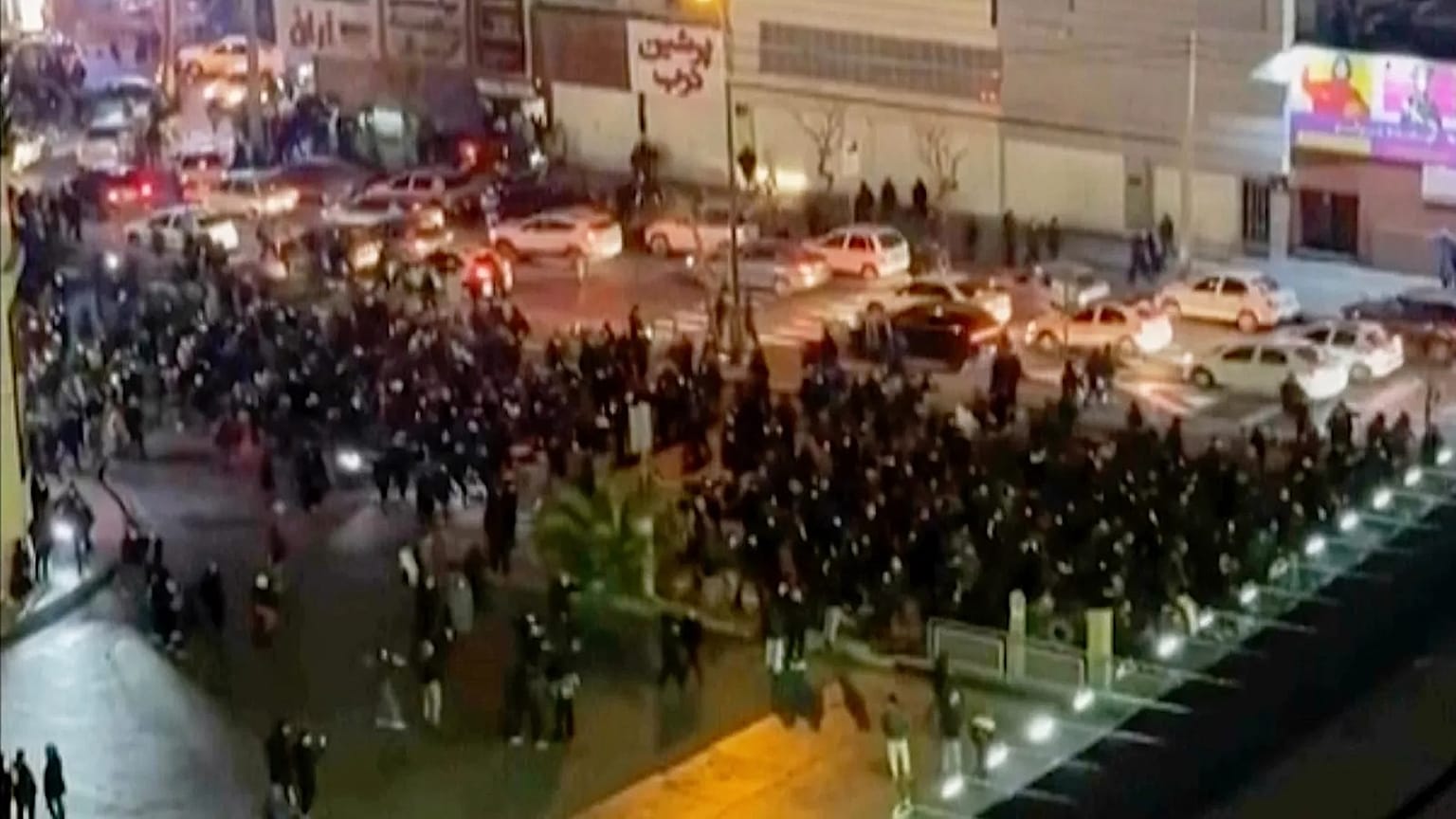 In this frame grab from video protesters block an intersection in Tehran, 8 January, 2026