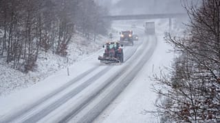 A snow plough cleans the road during a heavy snowfall in Viborg, central Jutland, Denmark, Wednesday Jan. 3, 2024.Temperatures have fallen below minus 40 degrees Celsius in t