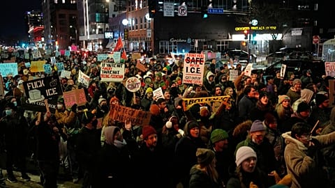  People participate in a protest and noise demonstration calling for an end to federal immigration enforcement operations in the city, Friday, Jan. 9, 2026, in Minneapolis. 