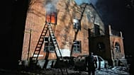 A residential building burns after a Russian strike in Kyiv, Ukraine, Friday, Jan. 9, 2026