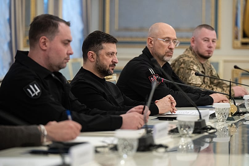 President of Ukraine Volodymyr Zelenskyy, second left, listens to British Defense Secretary John Healey during their meeting in Kyiv, Ukraine, Friday, Jan. 9, 2026